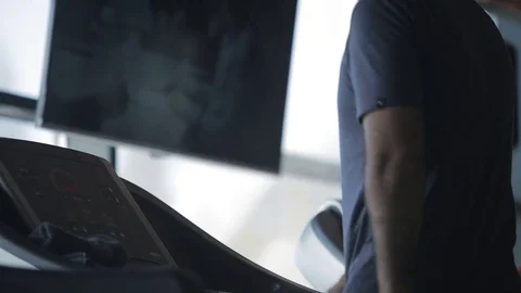 Dnipro March 2017. Young athletic man running on treadmill in sport gym. Cardio. Stock Footage 81206959