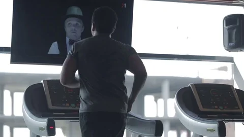 Dnipro March 2017. Young athletic man running on treadmill in sport gym.  Stock Footage 81206986