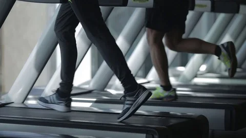 Dnipro March 2017. Young athletic people running on treadmill in sport gym.  Stock Footage 81207008