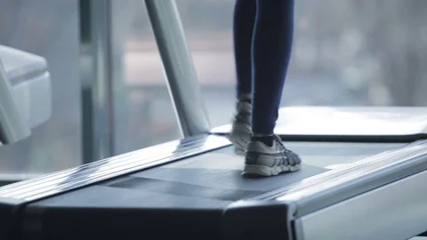 Dnipro March 2017. Young athletic woman running on treadmill in sport gym.  Stock Footage 81207078