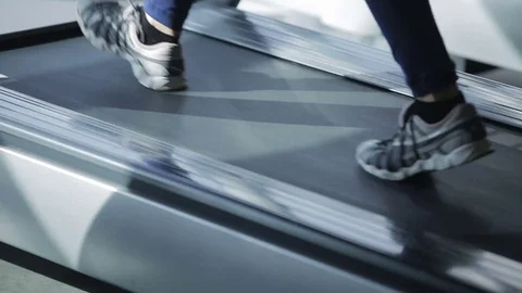 Dnipro March 2017. Young athletic woman running on treadmill in gym. Close-up  Stock Footage 81207079