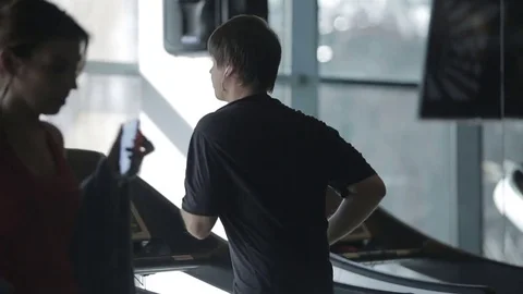 Dnipro March 2017. Young athletic man running on treadmill in sport gym.  Stock Footage 81207080