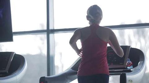 Dnipro March 2017. Young slim woman running on treadmill in sport gym.  Stock Footage 81206995