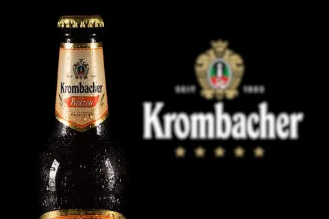 Dnipro, Ukraine, 18 oct, 2023: Krombacher weizen beer with drops on logo back Stock Photos