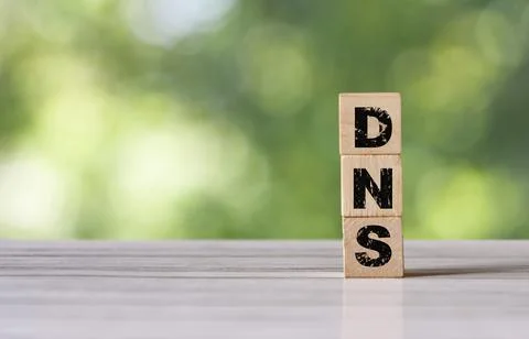DNS  concept of the domain name system on wooden cube - network symbol Stock Photos