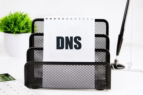 DNS Domain Name Server on a piece of paper on a white background Stock Photos