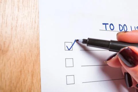 To do checklist on a light floor. Stock Photos