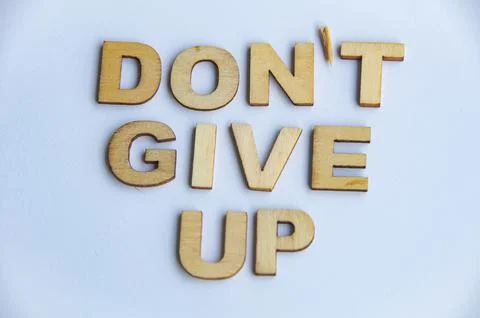 Do do give up text on white background Fotos Stock