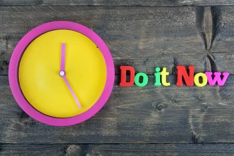 Do it now on wooden table Photos