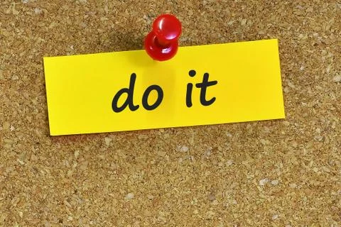 Do it  word on notes paper with cork background Stock Photos