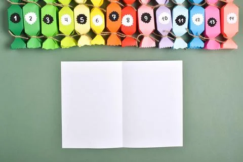 DO IT YOURSELF. Advent calendars made of colored paper in the shape of sweets Stock Photos