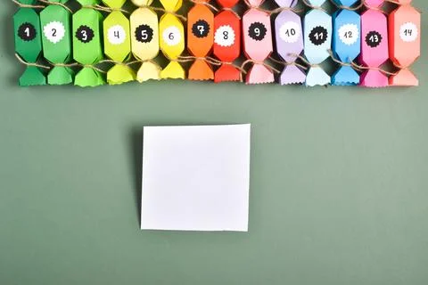 DO IT YOURSELF. Advent calendars made of colored paper in the shape of sweets Stock Photos