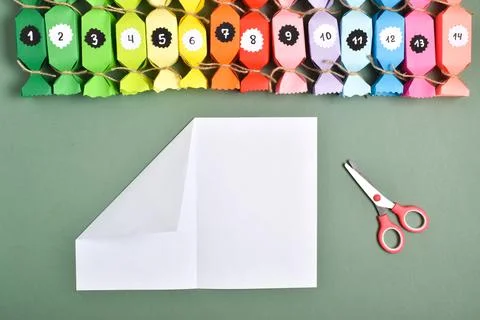 DO IT YOURSELF. Advent calendars made of colored paper in the shape of sweets Stock Photos