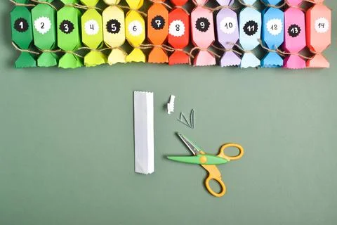 DO IT YOURSELF. Advent calendars made of colored paper in the shape of sweets 库存照片