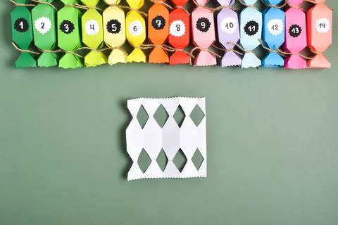DO IT YOURSELF. Advent calendars made of colored paper in the shape of sweets Stock Photos