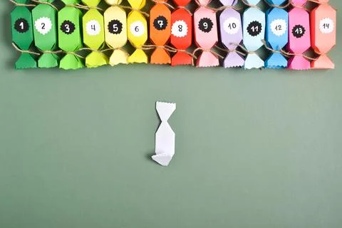 DO IT YOURSELF. Advent calendars made of colored paper in the shape of sweets Stock Photos