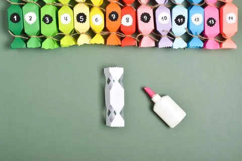 DO IT YOURSELF. Advent calendars made of colored paper in the shape of sweets Stock Photos
