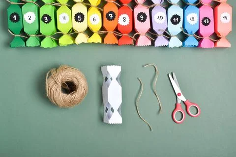 DO IT YOURSELF. Advent calendars made of colored paper in the shape of sweets Stock Photos