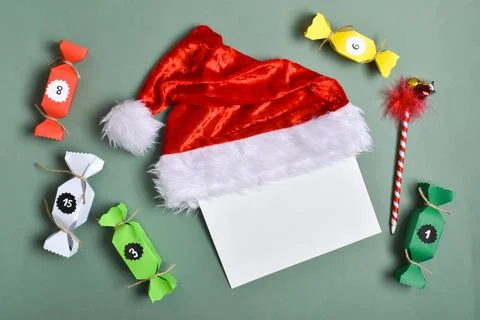 DO IT YOURSELF. Advent calendars made of colored paper in the shape of sweets Stock Photos