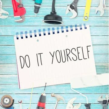 Do it yourself against tools and notepad on wooden background Illustrazione stock