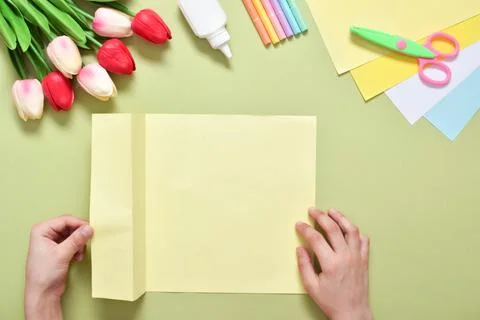 Do it yourself. A children's postcard made of paper with a rabbit. Step-by-st Stock Photos