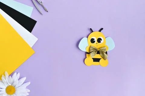 DO IT YOURSELF. DIY bees made of colored paper with kids at home. Step-by-ste Stock Photos