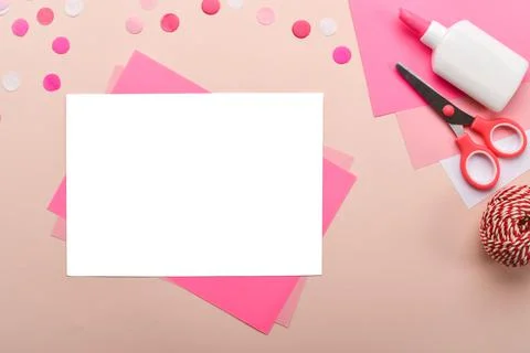 DO IT YOURSELF. An empty sheet with a place for text next to colored paper an Stock Photos