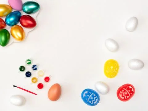 Do it yourself set for painting easter eggs with stencils, tassel, paints and Stock Photos