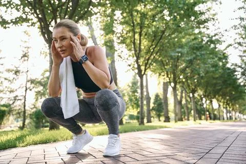 Do it for yourself. Tired middle aged athletic woman in sportswear looking away Stock Photos
