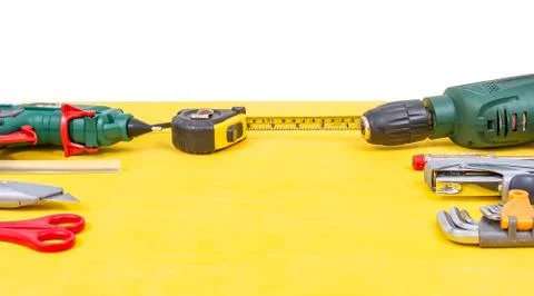 Do it yourself tools on yellow background. DIY tools with copy space for text Foto stock