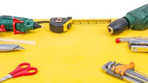 Do it yourself tools on yellow background. DIY tools with copy space for text Stock Photos