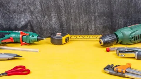 Do it yourself tools on yellow background. DIY tools with copy space for text Stock Photos