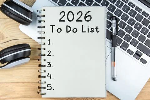 To Do List 2026 text on notepad with laptop and a earphone Stock Photos