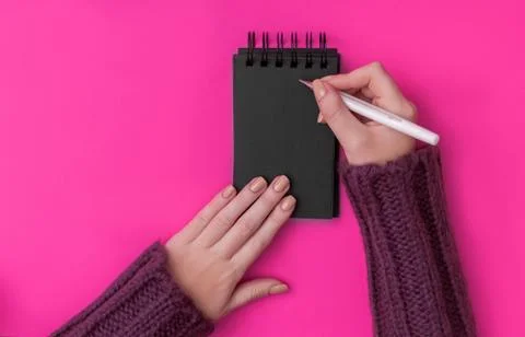 To do list in black spiral notepad. Stock Photos