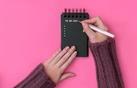 To do list in black spiral notepad. Stock-Fotos