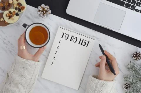 To do list. Flat lat top view notepad with to do list, notebook,laptop tea,woman Stock Photos