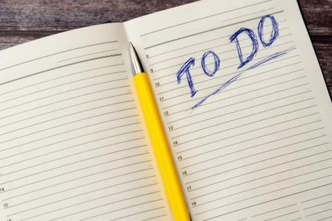 To do list in opened business notebook and pen Stock Photos