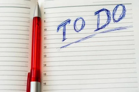 To do list in opened business notebook and pen Stock Photos