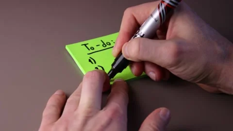 To-do list on a post-it note Stock Footage 147138211