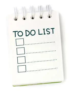 To do list on white paper notebook Stock Photos