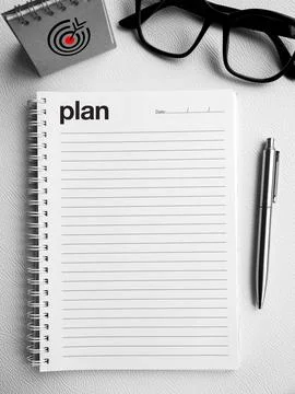 To do list. Word "plan" on the top of white blank spiral notebook or vertic.. Stock Photos