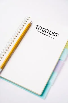 TO DO LIST wordings on a notebook on a table Stock Photos