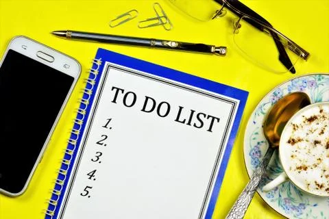 To-do list is written on a Notepad. Action plan for the future. Stock Photos