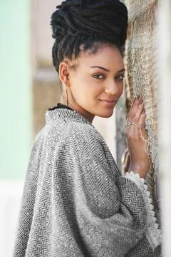 Do more than just exist. Portrait of a fashionable young woman posing against a Stock Photos