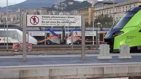 Do not cross the tracks - Use the underpass - Railway sign in the station wi Stock Footage 291815217