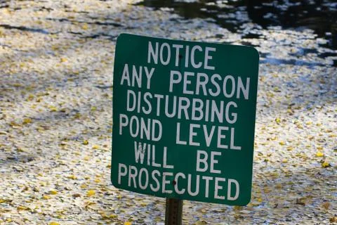 Do not disturb pond level. Stock Photos