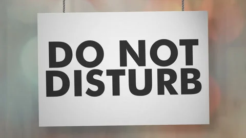 Do Not Disturb Sign Swinging on Bokeh Background with Luma Matte Stock Footage 346071187