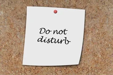 Do not disturb written on a memo Stock Photos