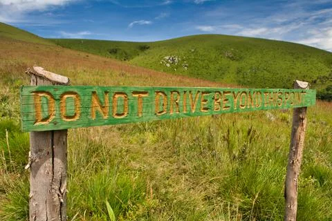 Do not drive beyond this point wooden sign in a national park in Africa Stock Photos