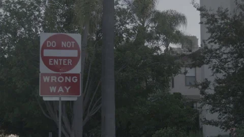 Do Not Enter and Wrong Way Traffic Sign with Cars Stock Footage 343968282